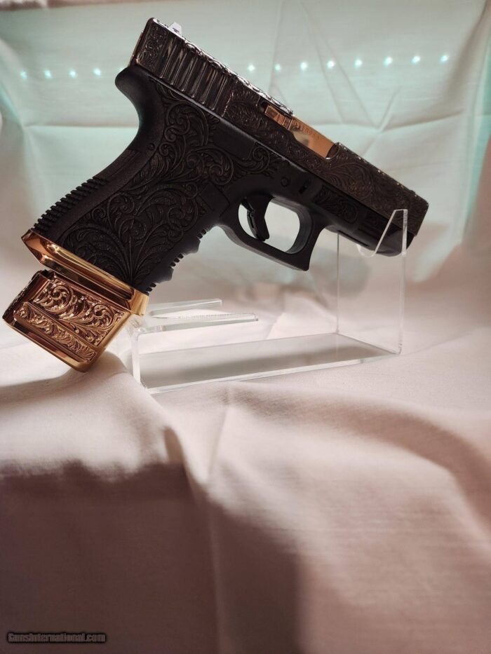 (One-Of-A Kind) Custom Engraved Glock G19 FXD 9MM. Agency Arms Mag Well, Mag Extension Engraved and 24K Gold Plated.